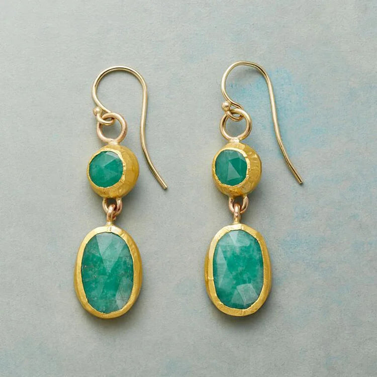 Brincos vintage ovais de cristal esmeralda dourados