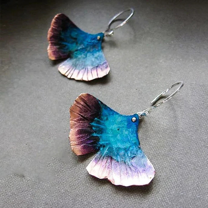 Brincos boho de borboleta azul em prata de lei