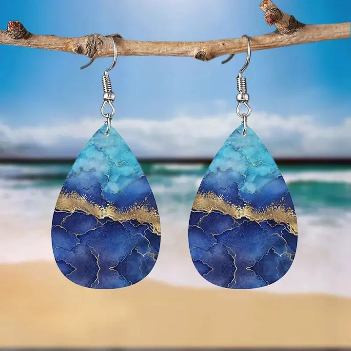 Brincos em formato de gota oceânica de verão