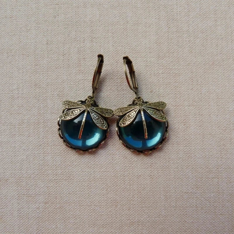 Brincos de cristal de libélula em ouro antigo