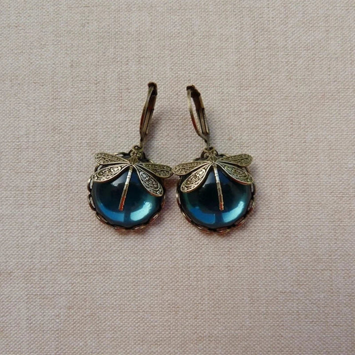 Brincos de cristal de libélula em ouro antigo