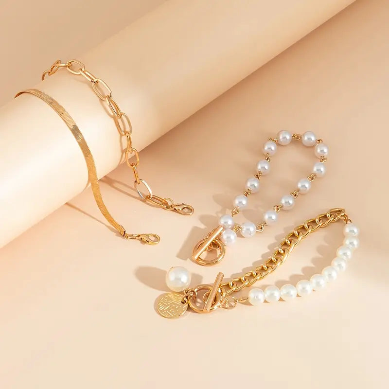 Conjunto de Pulseiras Chic Douradas com 4 Peças – Cobra, Pérolas e Elos
