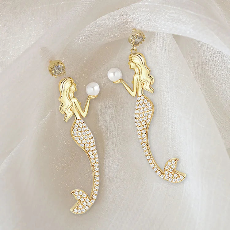 Brincos de pérolas estilo sereia com inspiração vintage