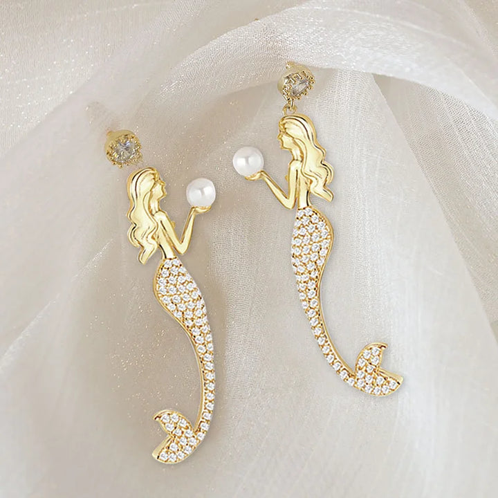 Brincos de pérolas estilo sereia com inspiração vintage