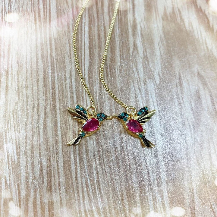 Brincos de pássaro de zircônia mista