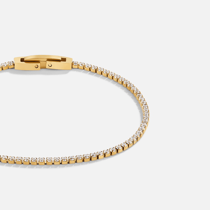 Pulseira Niyah de Cristal Branco com Detalhes em Ouro